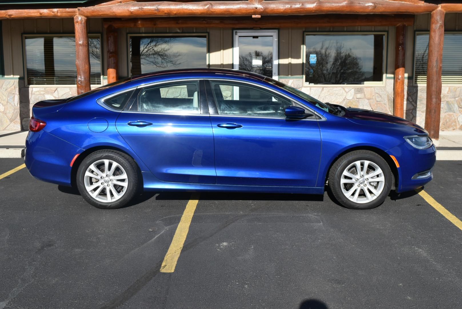 2016 Blue /White Chrysler 200 Limited (1C3CCCAB6GN) with an 2.4L 4 Cyl Multiair engine, 9-Speed Automatic transmission, located at 1600 E Hwy 44, Rapid City, SD, 57703, (605) 716-7878, 44.070232, -103.171410 - Photo#4